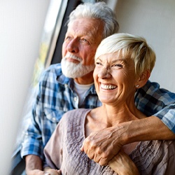 couple enjoying the benefits of dentures in Westhampton