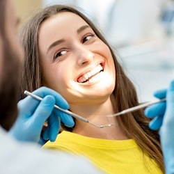 smiling woman dentist checkup