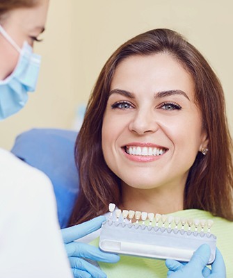 smiling patient with color guide