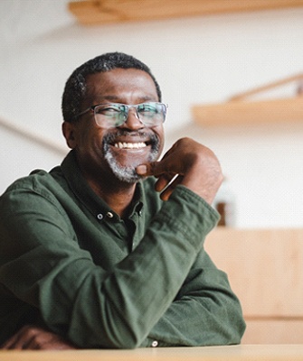 man smiling with dentures in Westhampton