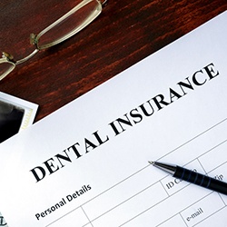 Dental insurance paperwork for the cost of dental implants in Westhampton