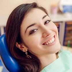 Smiling woman in dental chair