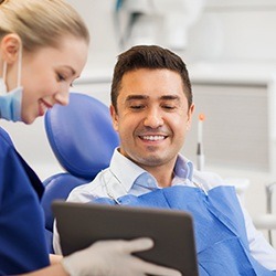 Smiling man in dental chair