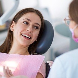 Smiling woman in dental chair