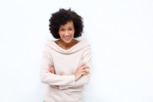 woman smiling after undergoing cosmetic dentistry