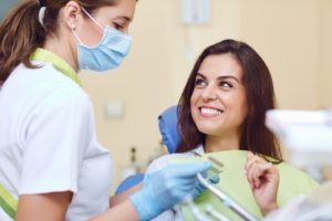 happy patient learning the facts about veneers and choosing them