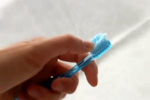 old toothbrush showing mistakes in oral hygiene routine